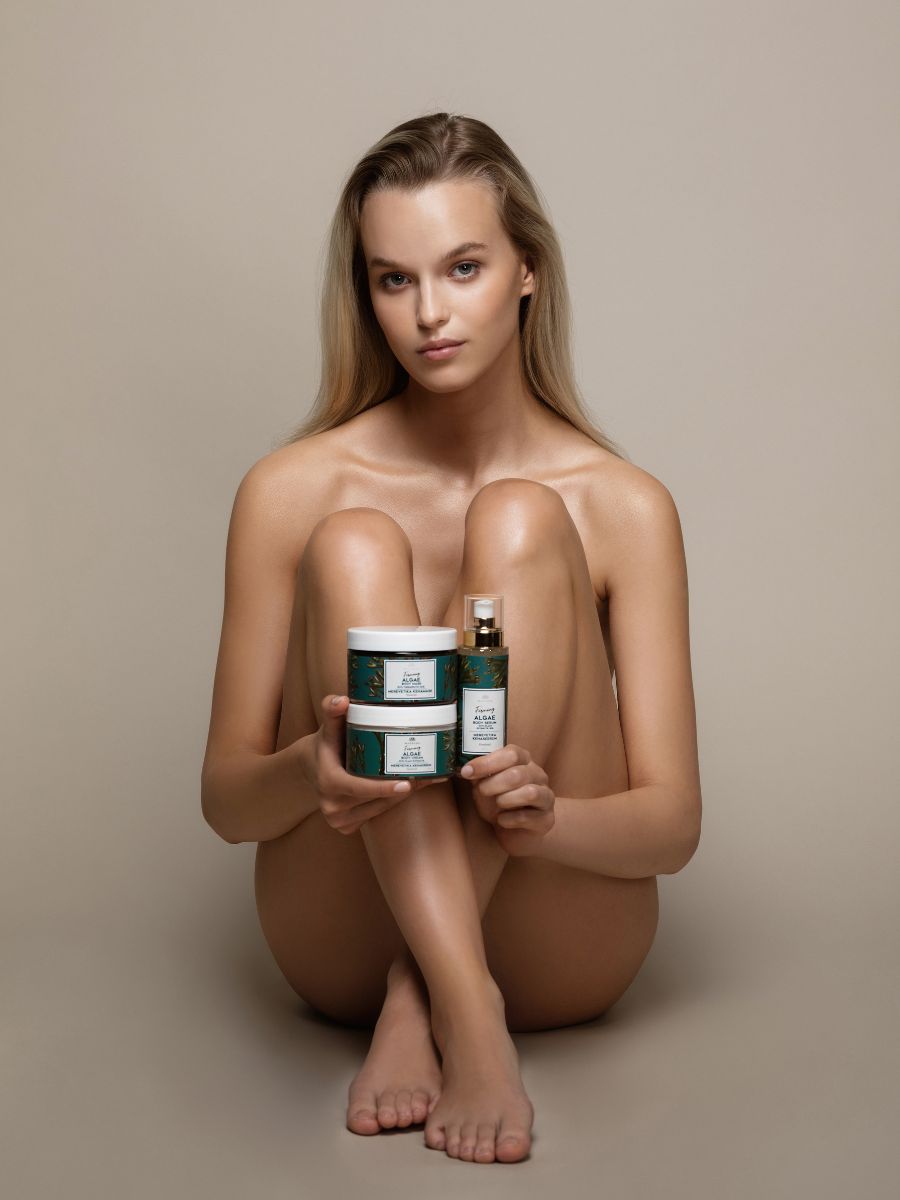 Woman holding Magrada Organic Cosmetics firming body kit products for firming body kit purchase
